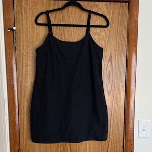Beyond Yoga Black Tennis dress with built in shorts and pockets